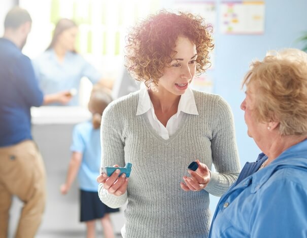 2 woman discussing inhaled medication